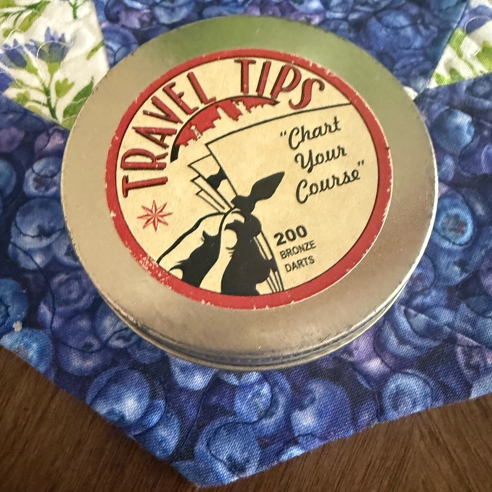 Travel Tips Bronze Darts Tin